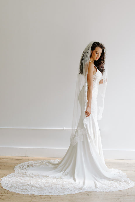Bride wears a Kennedy Blue Lace Veil