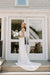 Bride stands outside of The Wedding Shoppe in Saint Paul, MN