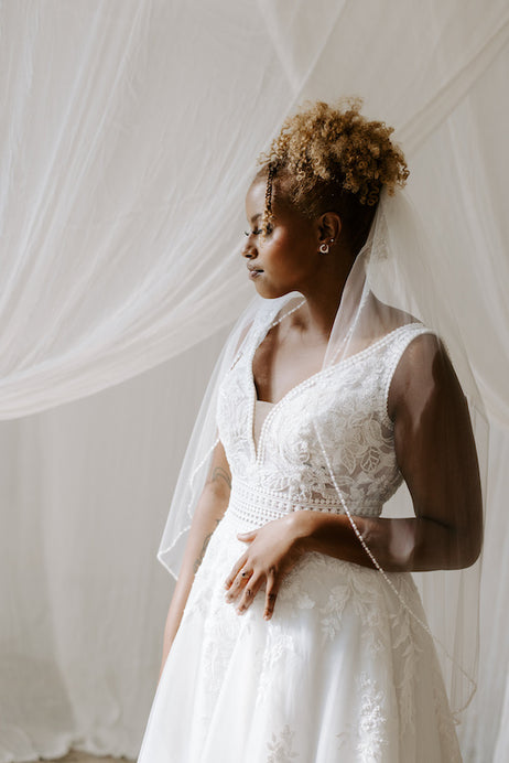 Bride wears a Kennedy Blue beaded veil